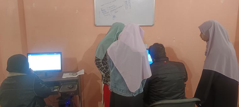 Learners working through an exercise together