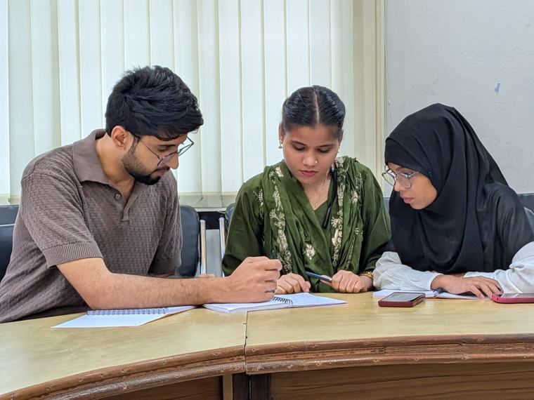Fellows working through an exercise together
